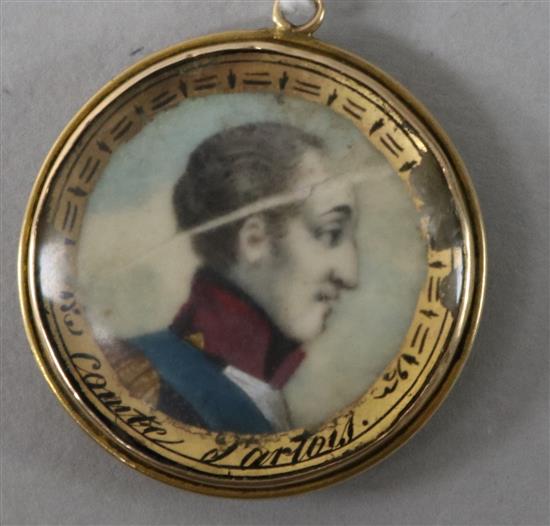 A late 18ct/early 19th century mourning pendant with bust of Comte dArtois and plaited hair en verso, 29mm.